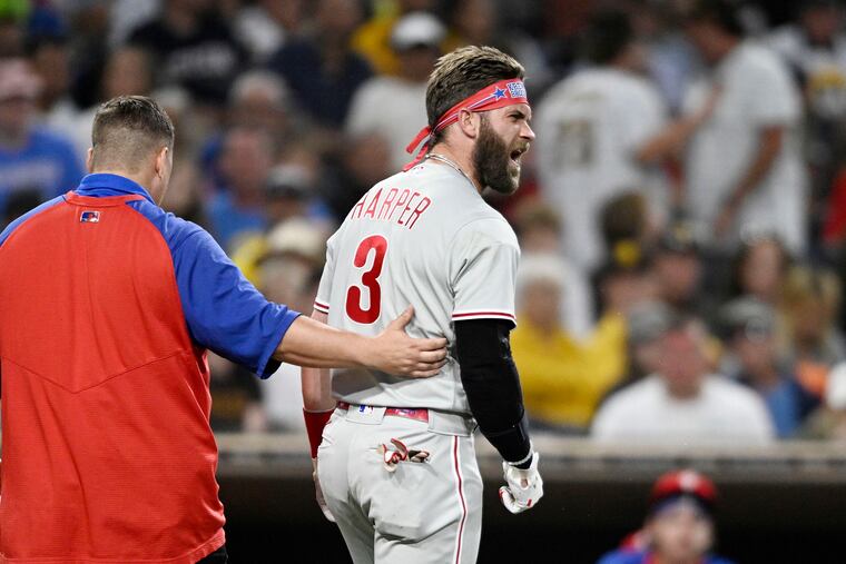 Bryce Harper yelling at Padres pitcher Blake Snell after being hit with a pitch in the fourth inning of a game on June 25 in San Diego. Harper will have surgery Wednesday, and there is no set timetable for his return.