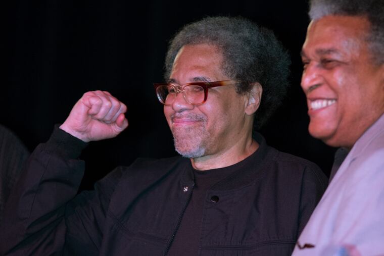 Albert Woodfox pumps his fist as he arrives on stage during his first public appearance at the Ashe Cultural Arts Center with Parnell Herbert, right, in New Orleans, Friday, Feb. 19, 2016, after his release from Louisiana State Penitentiary in Angola, La., earlier in the day. Woodfox, who was the last of three high-profile Louisiana prisoners known as the "Angola Three" to be released, died Thursday, Aug. 4, 2022, of complications from COVID-19, according to a statement from his family. He was 75.