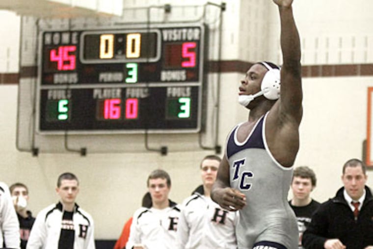 Timber Creek's Bryce Shade (pictured) and his brother, Blaze, share a connection on the mat. (Elizabeth Robertson/Staff Photographer)
