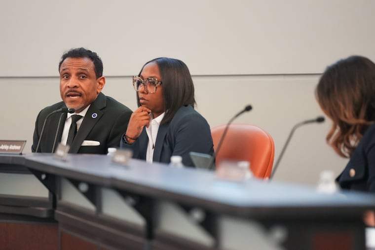 Superintendent Tony B. Watlington and school board vice president Sarah Ashley Andrews during Thursday's tense board meeting.