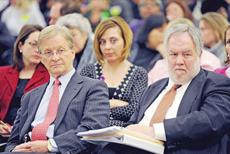 Thomas Knudsen (left), the district's "chief recovery officer," and former district CFO Michael Masch (right), who is now a "special adviser" to Knudsen. (Sarah J. Glover / Staff Photographer)