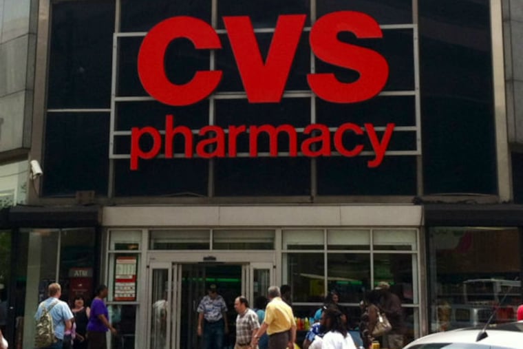 CVS storefront on East Market Street, Philadelphia. CVS Pharmacy. June 2013. (Reid Kanaley / Staff)