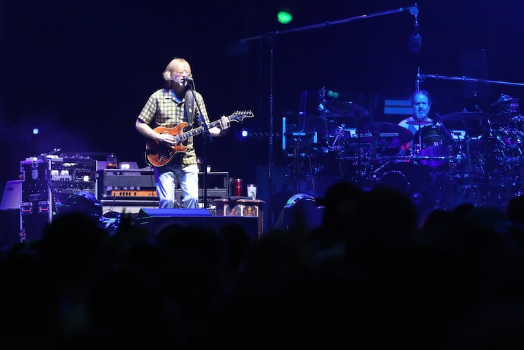 Lead guitarist Trey Anastasio, drummer Jon Fishman, and the rest of Phish perform in Atlantic City in 2021.