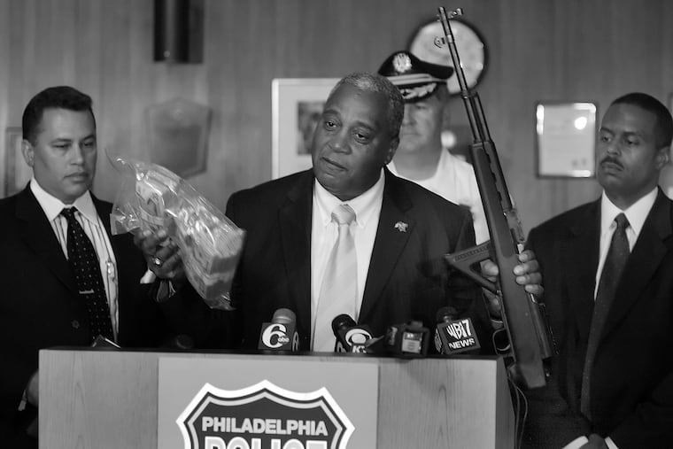 Philadelphia Police's Narcotic Strike Force with Commissioner Sylvester Johnson in 2005 showing off $ 75,000 in cash and a assult weapon.