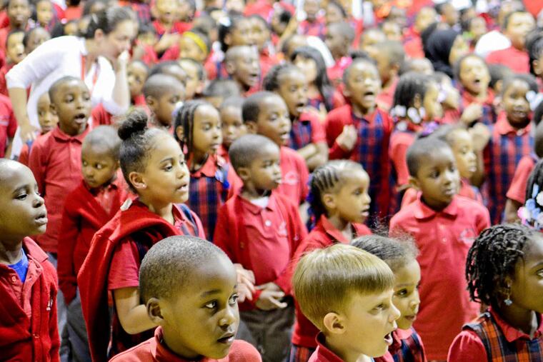 RRXPALMER30. May 29 2014. Elementary school students participating in an indoor rally to help prevent their school, Walter D. Palmer Leadership Learning Partners Charter School from closing. (VIVIANA PERNOT/Staff Photographer)
