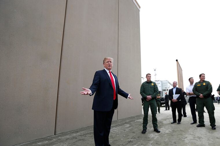 President Donald Trump tours border wall prototypes in March 2018. Now, maybe he, supporters, and wealthy pals can pay for the real thing.