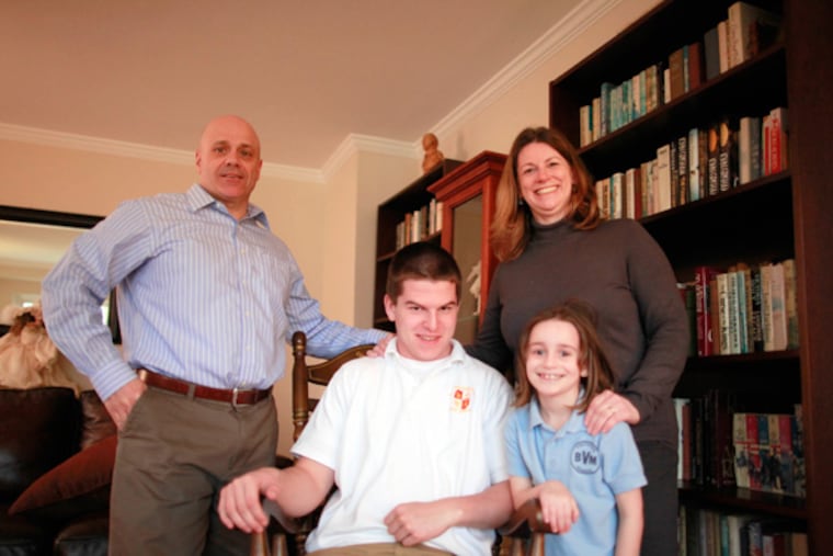 John and Karen Pascucci at home in East Norriton with their newly adopted son, Ethan, 17; and their daughter Charley, 6. (David Swanson / Staff Photographer)