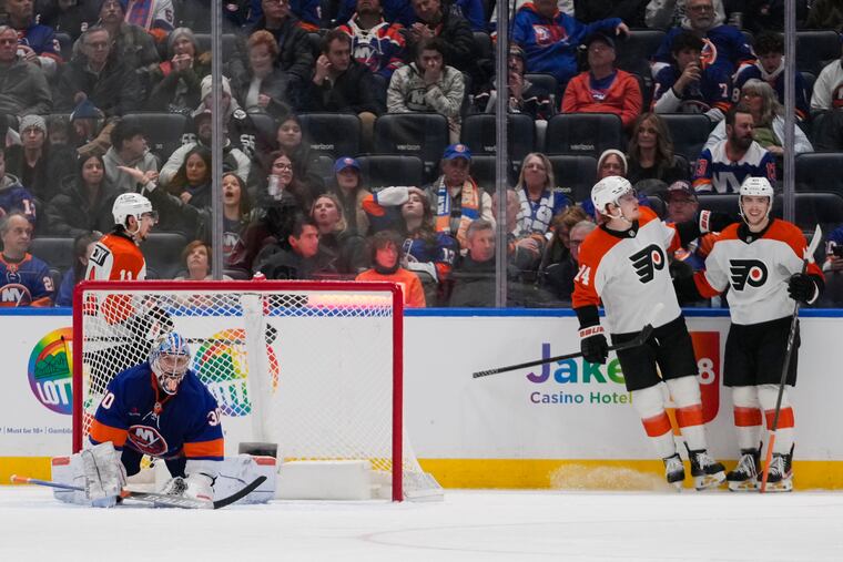Flyers' Morgan Frost (right) celebrates with Owen Tippett (left) after scoring a goal during the second period.