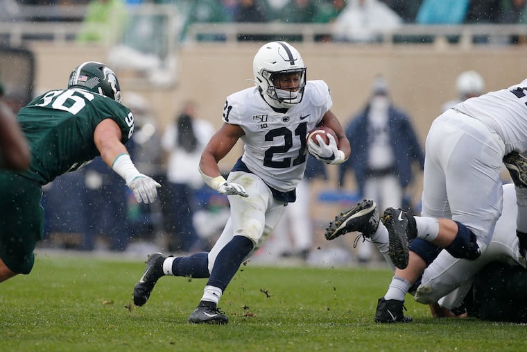 Penn State running back Noah Cain rushes against Michigan State last season. Cain will miss the rest of the season with an injury.