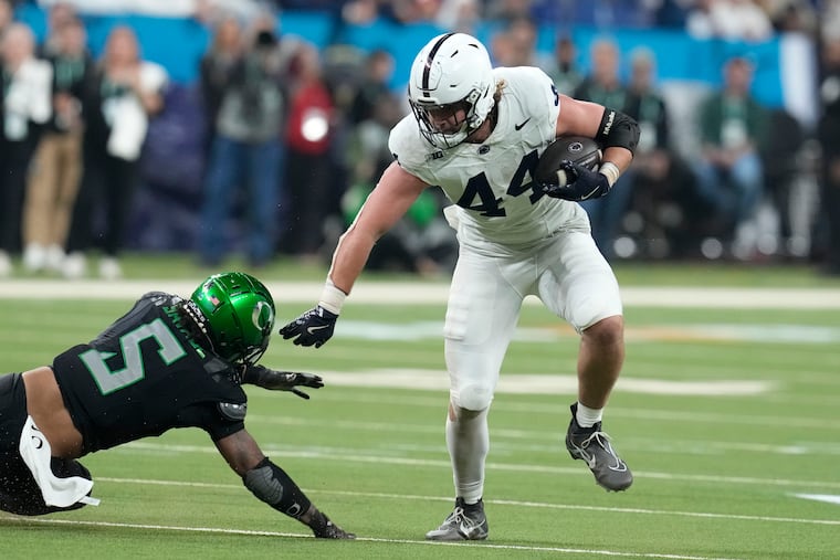 Penn State tight end Tyler Warren (right) won the 2024 John Mackey award, which is awarded to the best collegiate tight end.