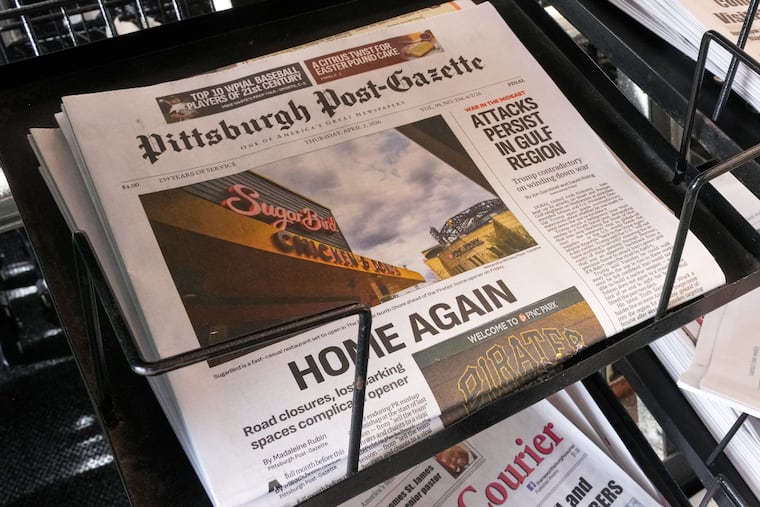 The print edition of the Pittsburgh Post-Gazette sits in a newspaper rack, Thursday, April 2, 2026, in Pittsburgh.