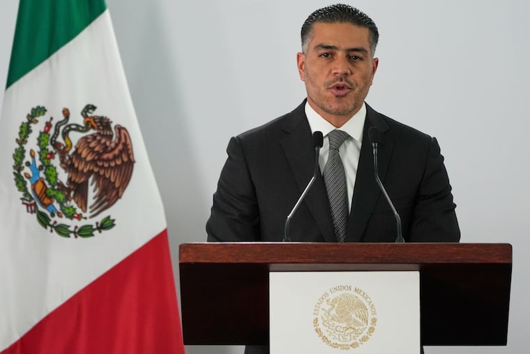 Mexican Security Minister Omar García Harfuch gives a news conference on Aug. 13, 2025, in Mexio City to announce that Mexico was sending 29 drug cartel figures to the United States.