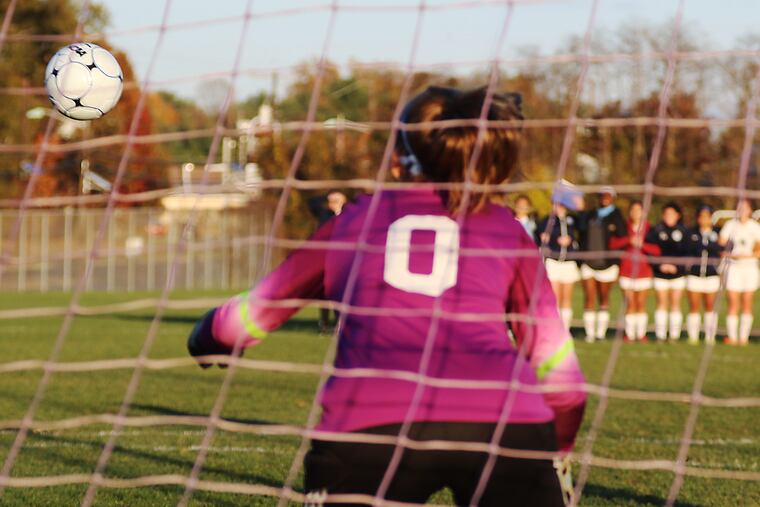 JHIGH12-E 11-11-2016 (AKIRA SUWA / For The Inquirer) GAME Story off Seneca at Highland in Girls Soccer Game. Seneca HS #12 Mackenzie Hoffman is successfully scores one of the penalty kick, Seneca HS won the game by Penalty Kick 4 to 2.