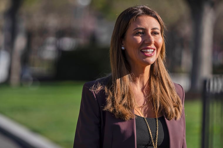 Alina Habba, President Donald Trump's pick to be the interim U.S. Attorney for New Jersey, arrives to speak with reporters outside the White House, March 26, 2025, in Washington.
