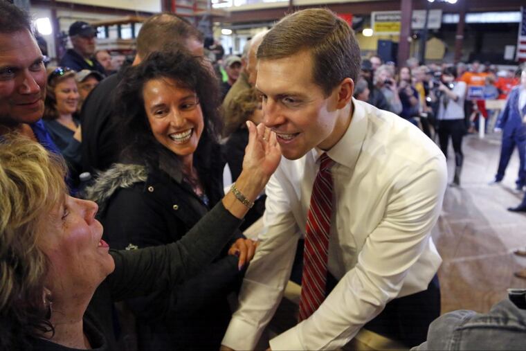 Conor Lamb, the Democratic candidate for Tuesday’s special election in Pennsylvania’s 18th Congressional District, greets supporters during a rally at the Carpenter’s Training Center in Collier, Pa., last week.