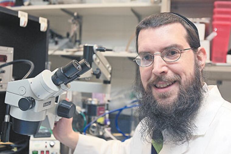 Dr.Michael Oshinsky of Jefferson University has found that caffeine helps to ease the worst effects of hangovers, which are caused by the breakdown of alcohol in the body. (Akira Suwa / Staff Photographer)