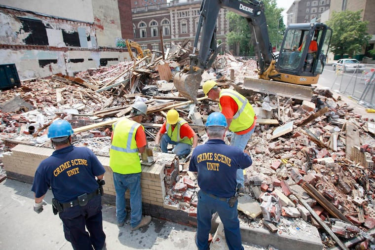 Demolition begins again at the site of the fatal building collapse at 22nd and Market Streets in 2013. (File photo: David Swanson / Staff Photographer)