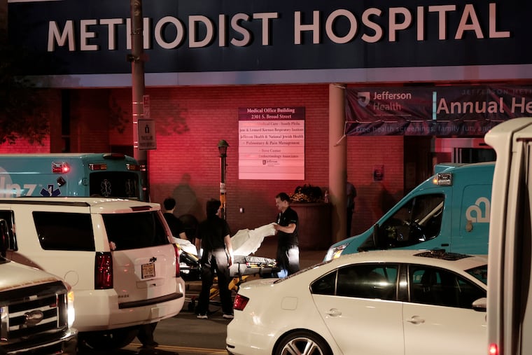 Ambulances line up on South Broad Street to evacuate patients from Jefferson Methodist Hospital in South Philadelphia in the early morning hours of Wednesday, May 20, 2026.