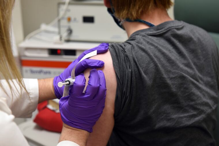 This May 4 photo provided by the University of Maryland School of Medicine shows the first patient enrolled in Pfizer's COVID-19 coronavirus vaccine clinical trial at the University of Maryland School of Medicine in Baltimore.