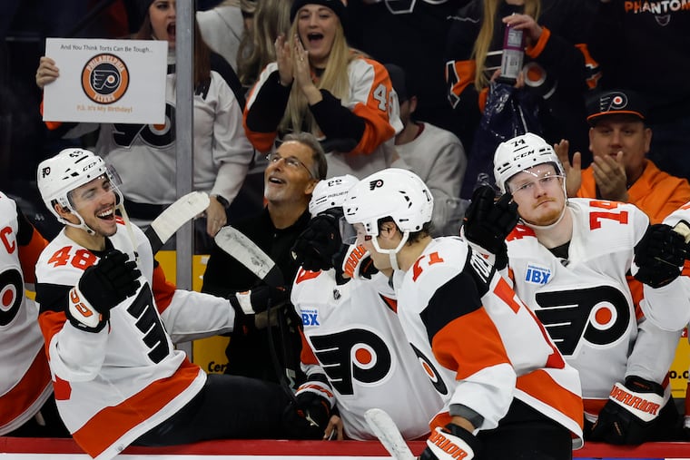 Flyers right wing Tyson Foerster celebrates his second period penalty shot goal with his teammates against the Ottawa Senators on March 2.
