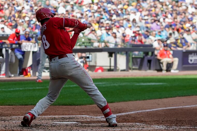 The Phillies' Didi Gregorius hits an RBI double during the fifth inning in Milwaukee.