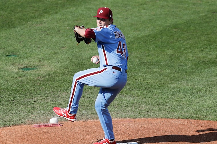 Phillies pitcher Spencer Howard uncorks a pitch during his major-league debut Sunday at Citizens Bank Park. Howard allowed four runs on seven hits in 4 2/3 innings in a loss to the Atlanta Braves.