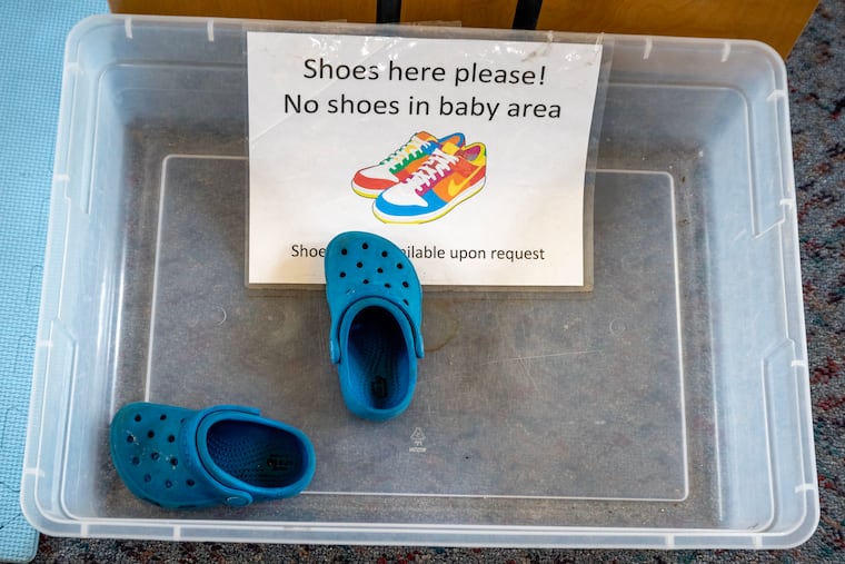 Shoe bin in the baby area at the Free Library’s Richmond Branch. Keeping germy shoes away from children seems like a good practice, but how important is going shoeless indoors for good health?