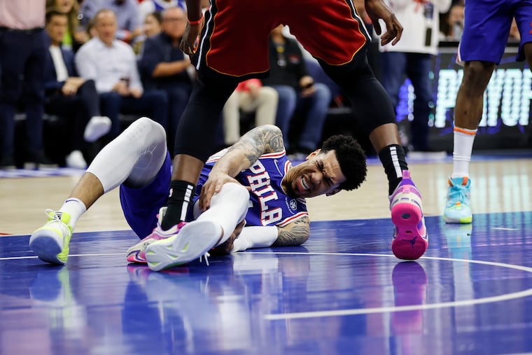 Sixers Danny Green goes down grabbing his knee playing against the Heat during the 1st quarter of game 6 of the Eastern Conference Semifinals at the Wells Fargo Center in Philadelphia, Thursday, May 12, 2022.