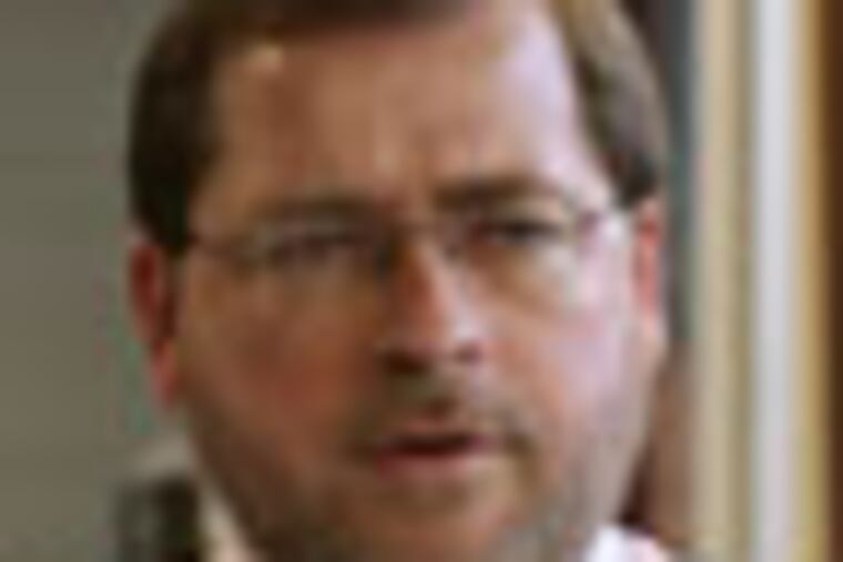 *** FILE *** Conservative activist Grover Norquist, President of the Americans for Tax Reform, stands in his office in Washington in this Jan. 26, 2006 file photo. "The temptation for an administration in the last two years is to do something for legacy purposes," Norquist said. "And with a Democratic House and Senate, doing something cannot be good." (AP Photo/Yuri Gripas, File)