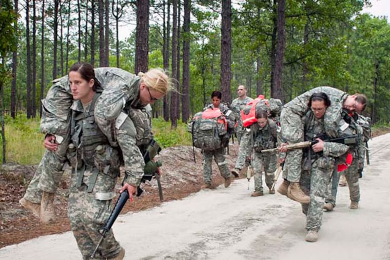 Should female recruits be capable of throwing a wounded comrade over one's shoulder while running under combat fire to safety?