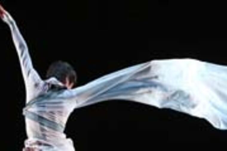 Mo Liu and Duane Lee Holland, Jr. in Kun-Yang Lin/Dancers' world premiere ONE-immortal game. Photo by Bill Hebert