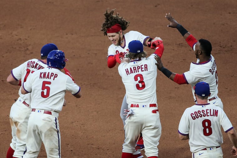 The Phillies looked bound for the playoffs after this Sept. 8 win over the Red Sox, but they have struggled in the last three weeks.