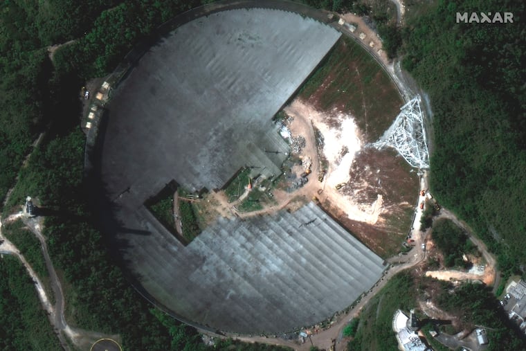 The dismantling of the damaged Arecibo Observatory dish in Arecibo, Puerto Rico. The observatory was a historic, world-famous telescope that after a series of cable failures led to the collapse of its receiving platform on Dec. 1, 2020, leaving roughly 900 tons of wreckage.