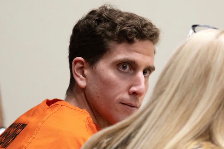 Bryan Kohberger, left, looks toward his attorney, public defender Anne Taylor, right, during a hearing in Latah County District Court in January in Moscow, Idaho.