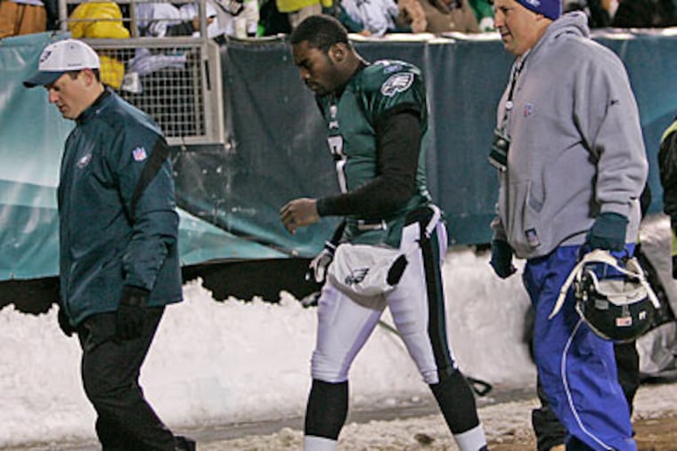 Michael Vick left the Eagles' win over San Francisco in the first quarter with a thigh bruise and did not return. (Michael Bryant/Staff Photographer)