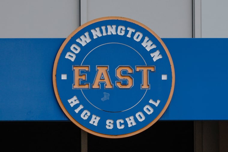Two Downingtown East students admitted to drinking while supervising a youth football camp last month, school officials said.