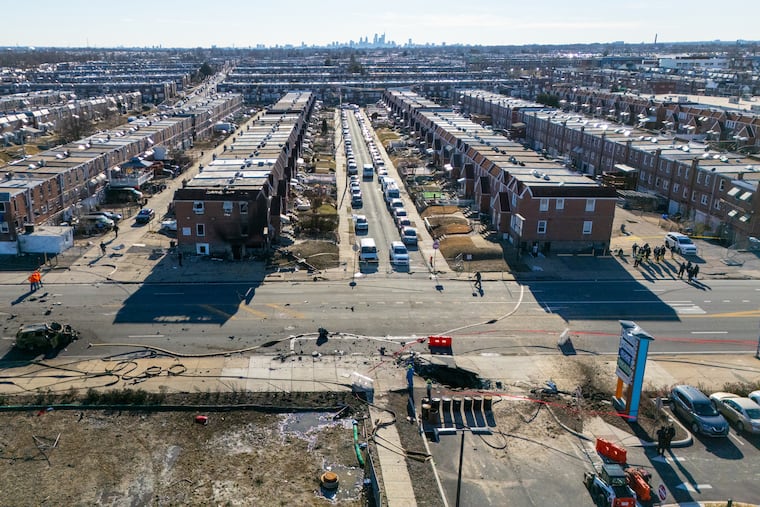 The scene of the plane crash east of Cottman Avenue toward Roosevelt Boulevard Saturday morning in Northeast Philadelphia. A medical transport jet crashed Friday night near Roosevelt Mall.