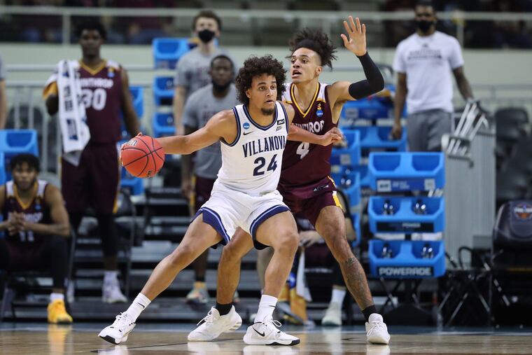Villanova's Jeremiah Robinson-Earl (24) pushes back against first-half defensive pressure from Winthrop's Kelton Talford (4) in the first round of the NCAA Tournament at Indiana Farmers Coliseum in Indianapolis on Friday.