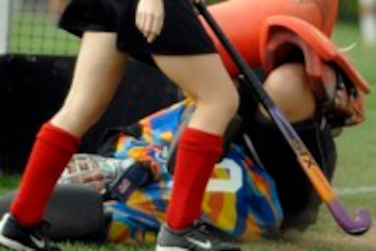 Conestoga goalie Charlotte Parkman sprawls, but too late to stop the Fords' Anna Rupnick from tying the game at 1-1. The Pioneers had taken the lead on Megan Deakins' goal.