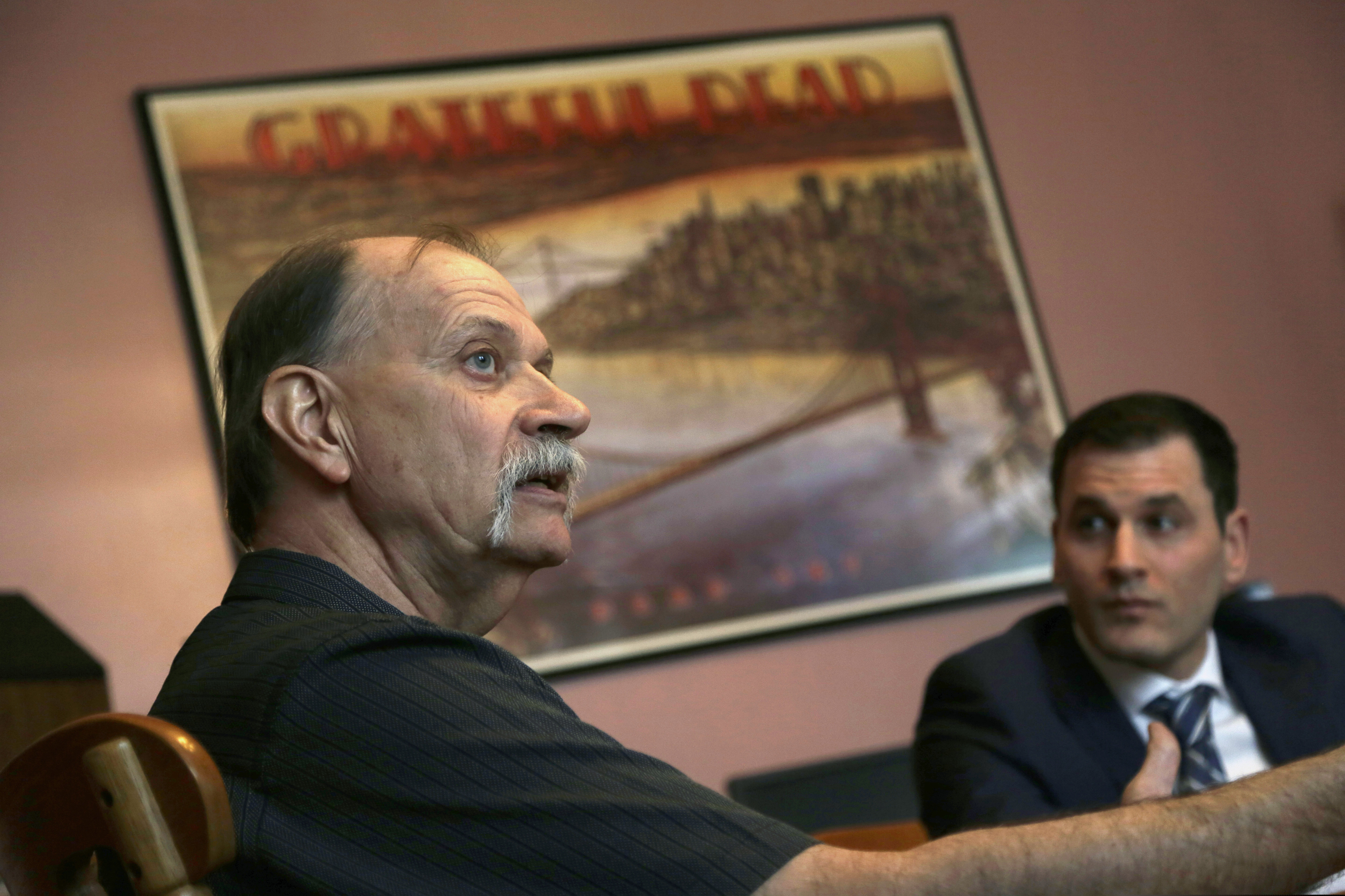 Mike Carpenter (left) said the settlement reached Thursday was a bittersweet victory. His attorney, Jordan Strokovsky (right) likened the investigation into Gregory Longenecker's death to a cover-up.