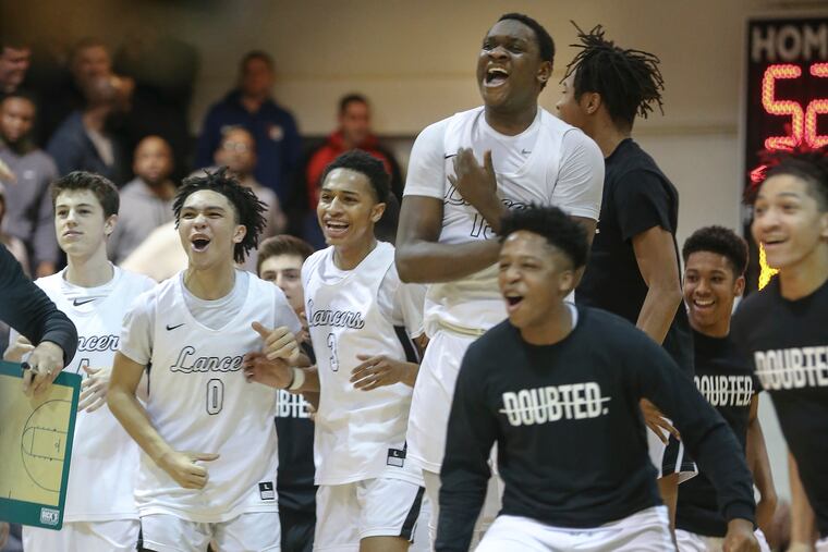 Bishop McDevitt players celebrating their quarterfinal victory over Archbishop Wood.