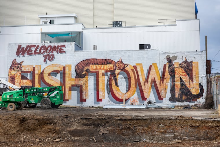 A last look at the Welcome To Fishtown mural that will soon be covered.