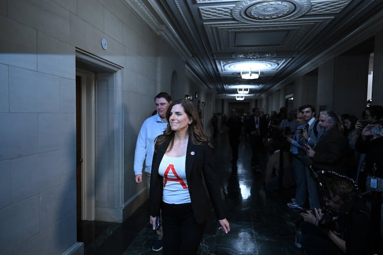 Rep. Nancy Mace arrives at a House Republican meeting in 2023 wearing a scarlet letter representing what she described as backlash to her vote to oust the speaker.