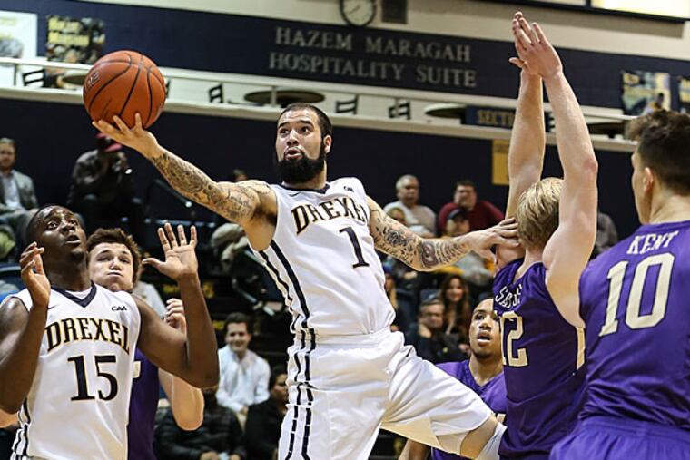 Drexel's Freddie Wilson grabs a loose ball against James Madison
during the first half of an NCAA college basketball game Thursday,
Jan. 15, 2015, in Philadelphia. (Steven M. Falk/Staff Photographer)