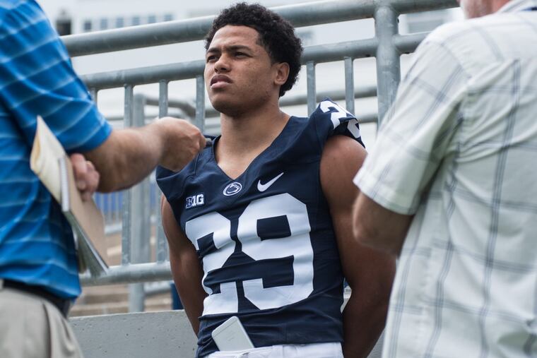 Penn State cornerback John Reid, here answering questions during Media Day last year, is an intern for Intel.