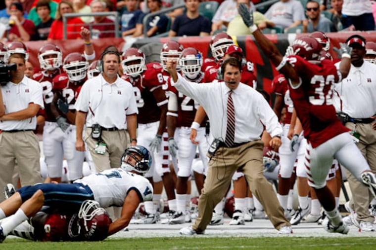 Former Temple head coach Al Golden reacts after a hit by Muhammad Wilkerson forces an interception against Villanova.