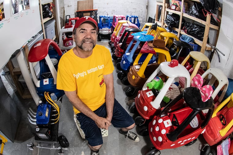Rich Nardiello is photographed with his plastic wheels project collection at his home in Sewell, NJ. Thursday, June 20, 2019. Rich, converts old Little Tikes Cozy Coupes into modern micro machines for sick kids.