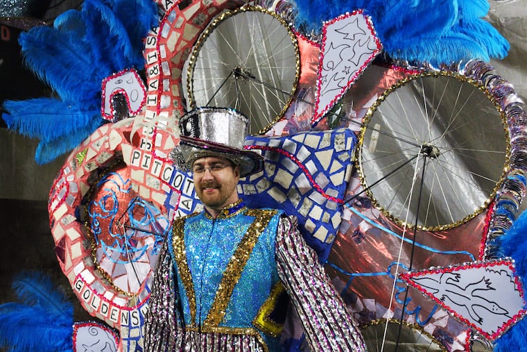 Michael Carwile of Golden Sunrise in his Mummers suit, a collaboration with Isaiah Zagar.