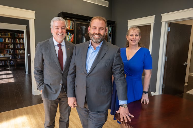 (Left to Right) Temple University President John Fry, donor and Temple alumnus Christopher Barnett, and Jennifer Ibrahim, dean of the College of Public Health, discuss Barnett's record $55 million gift to Temple.