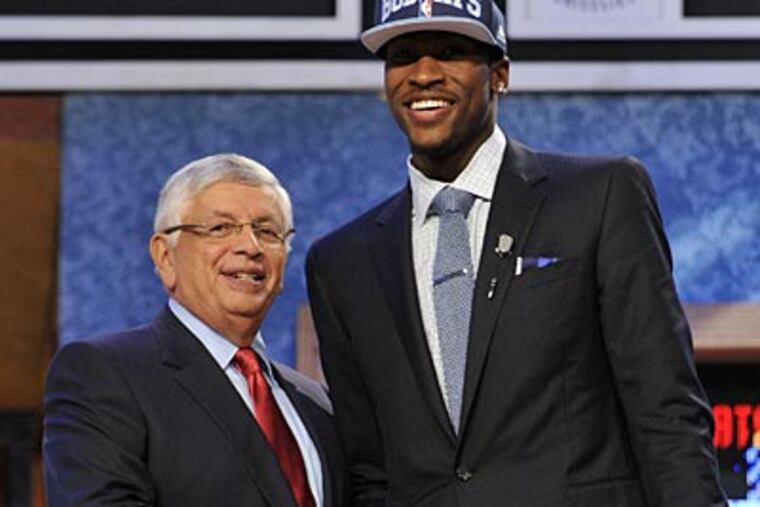 NBA Commissioner David Stern poses with the No. 2 overall pick Michael Kidd-Gilchrist. (Bill Kostroun/AP)